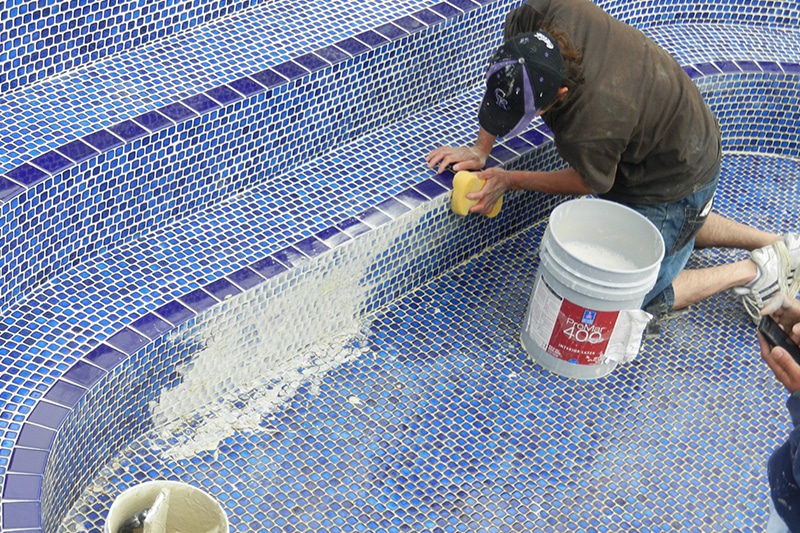 grouting tile on new pool
