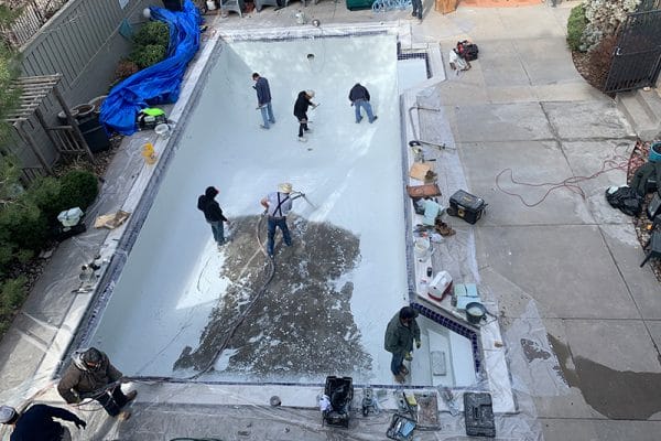 Painting a pool after repairs